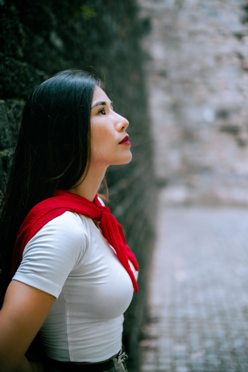 pensive woman in urban setting profile view